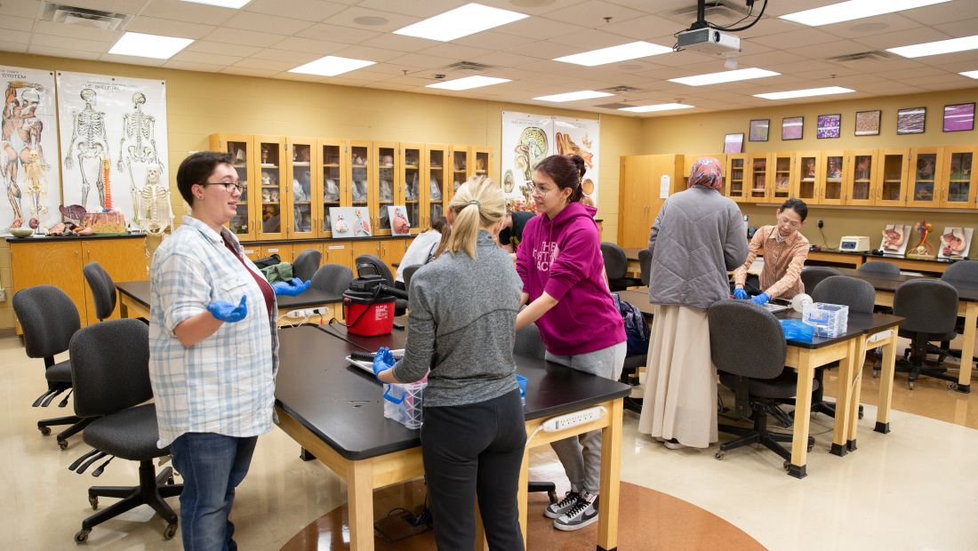 Biology students with instructor