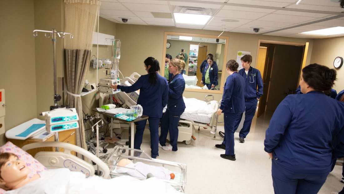 Practical Nursing students with patient