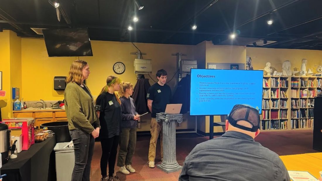 Team CycoGraphix presenting their 12-hour challenge.