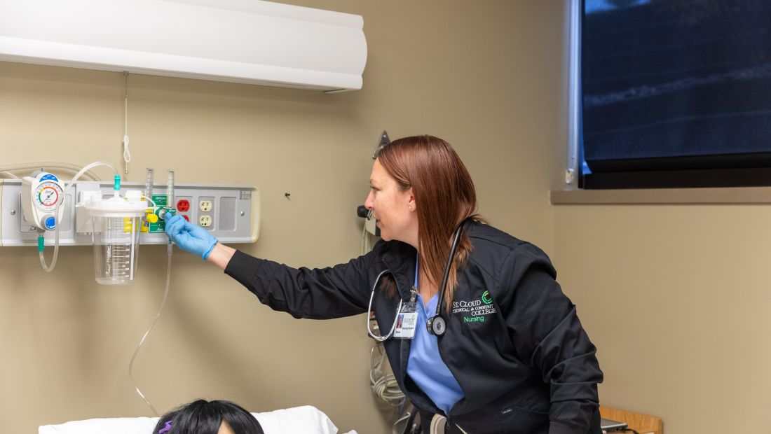 Nursing Student practices with Training Mannequin