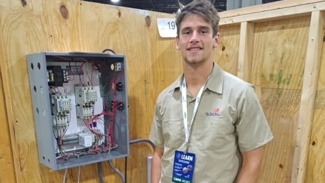 Student with electrical panel