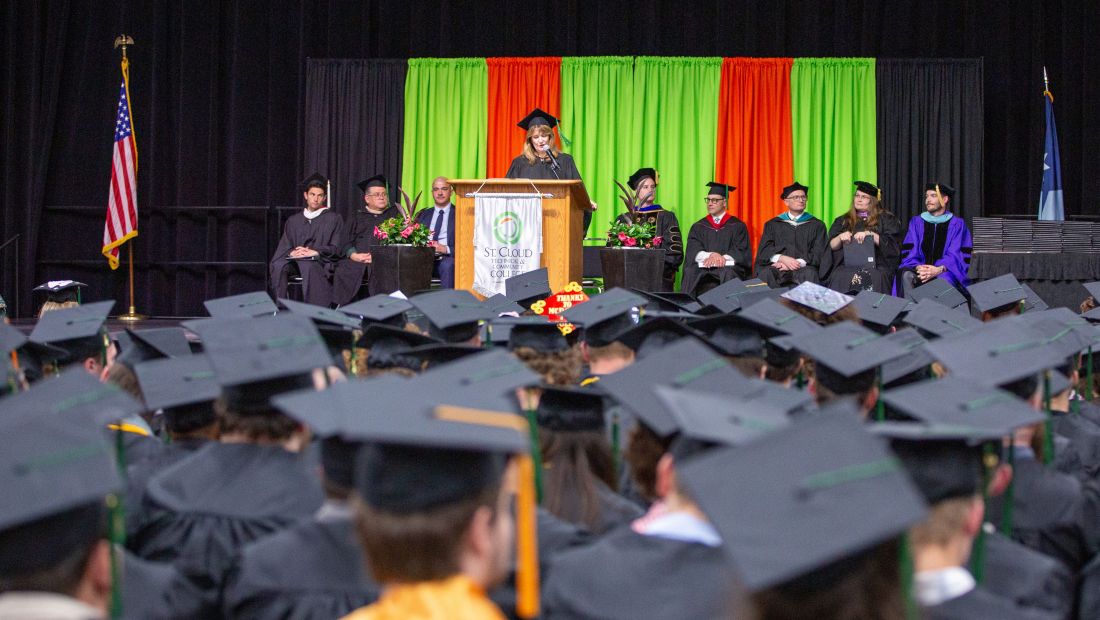 President Kloos speaking at commencement