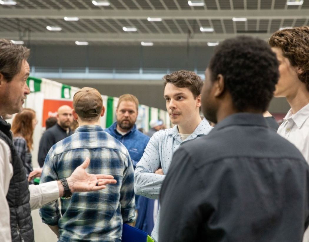 Job fair people talking