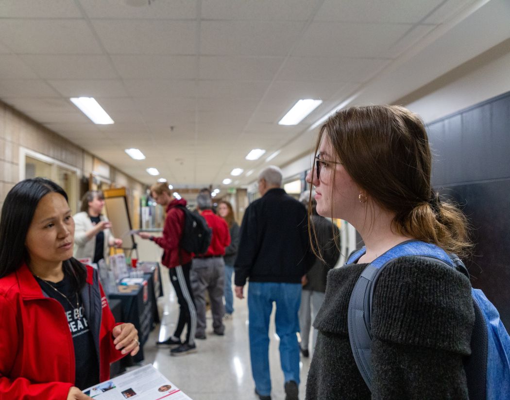 student talking with rep