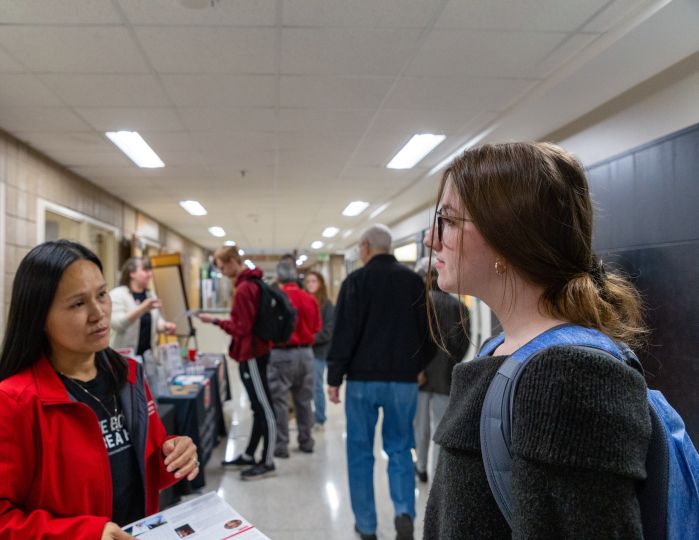 student talking with rep