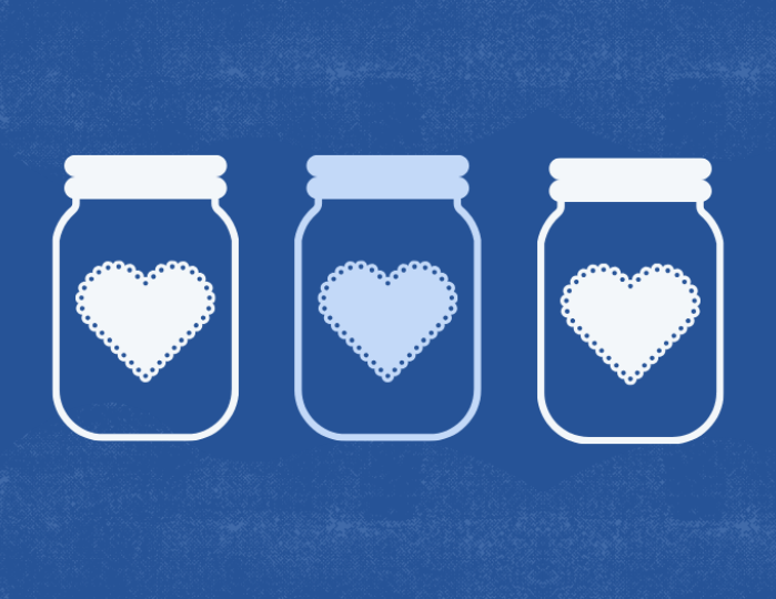 three jars with lace hearts on them 