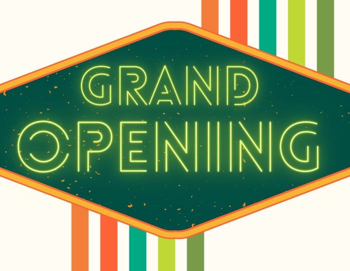Grand opening text in neon light type letters
