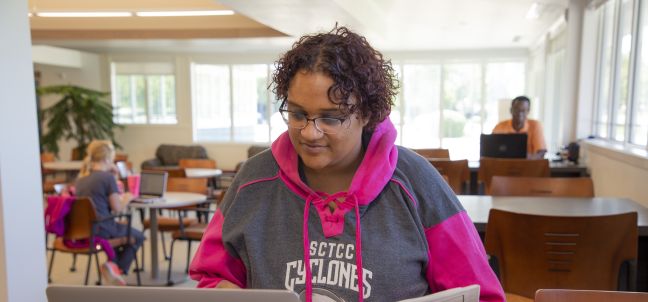 student at laptop
