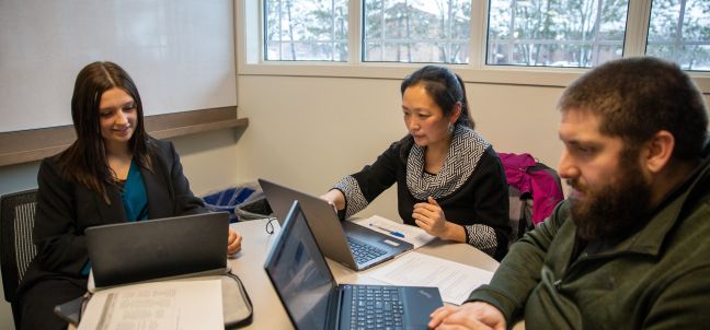 Business Management Students with Instructor