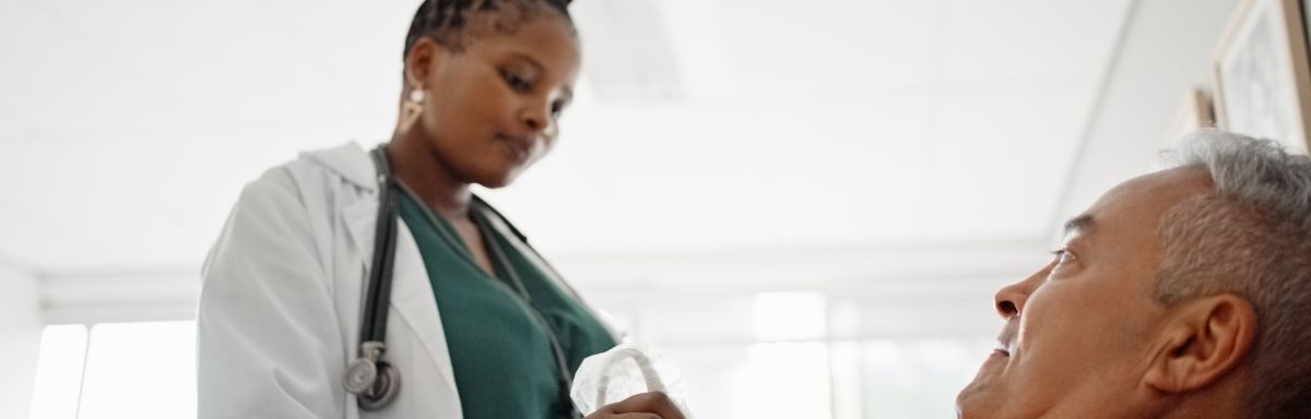 Echocardiologist scanning a patient