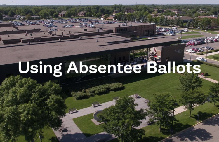 Using Absentee Ballots. overhead view of door 1 entrance in background