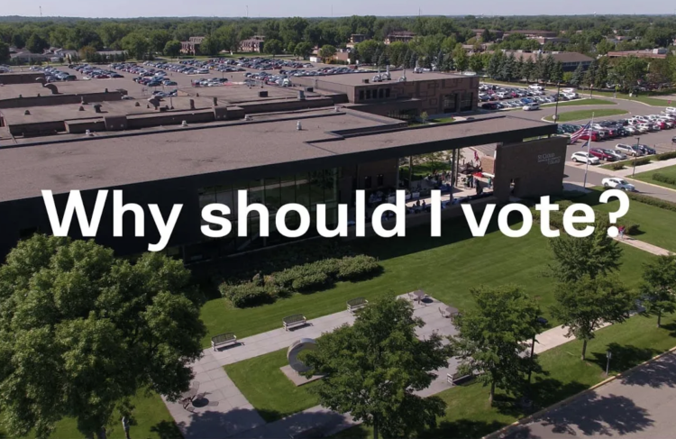 Why Should I vote? overhead view of door 1 entrance in background