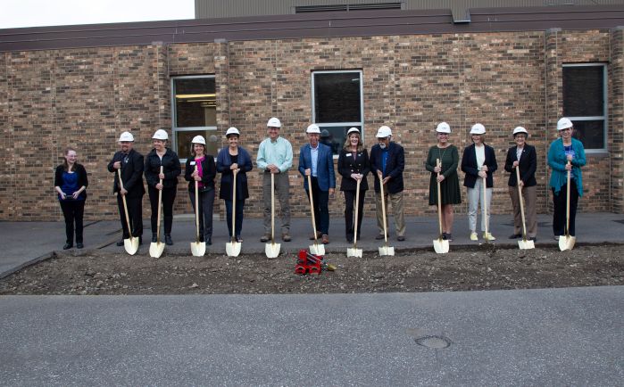 Group with shovels for groundbreaking