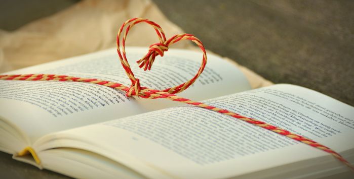 book with heart string