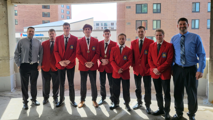 MHT students in red jackets for skills