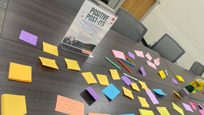 A bunch of post-its on a table