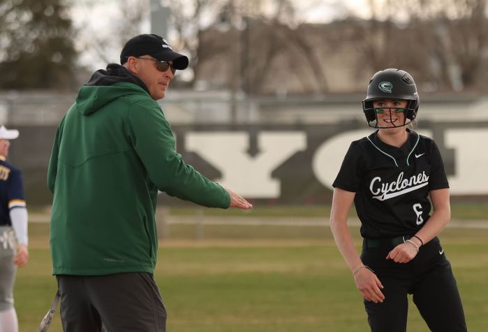 Greg Thorstad with a softball player