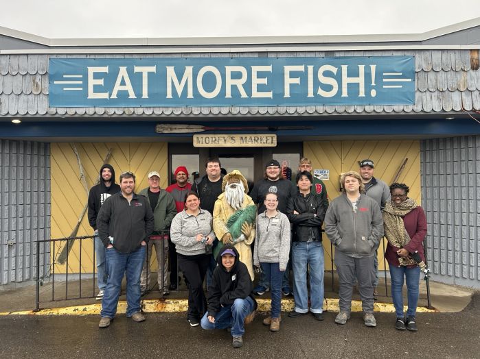 Students and instructors pose outside the Morey's plant