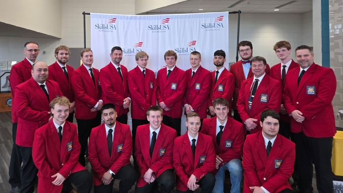 SkilllsUSA participants pose as a group