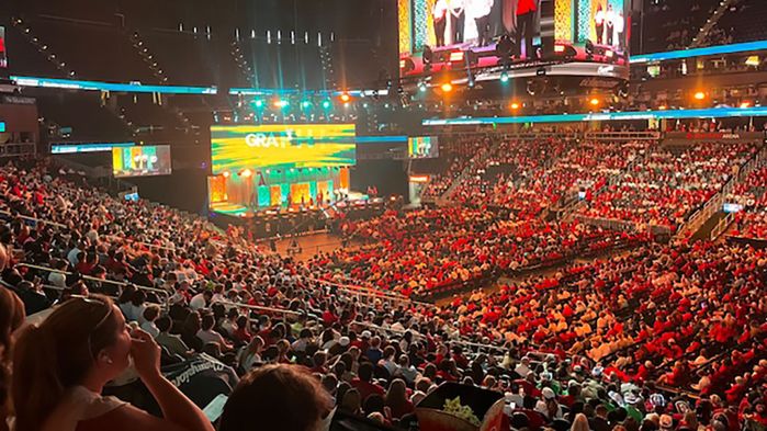 large crowd in an arena at skills conference
