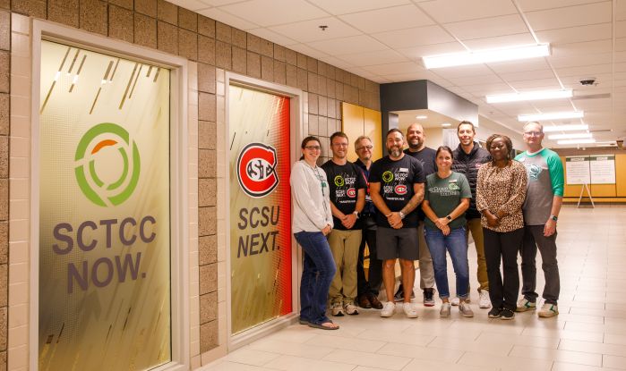 group of SCTCC and SCSU folks in front of husky hub