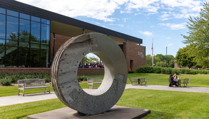 SCTCC donut sculpture with students in background