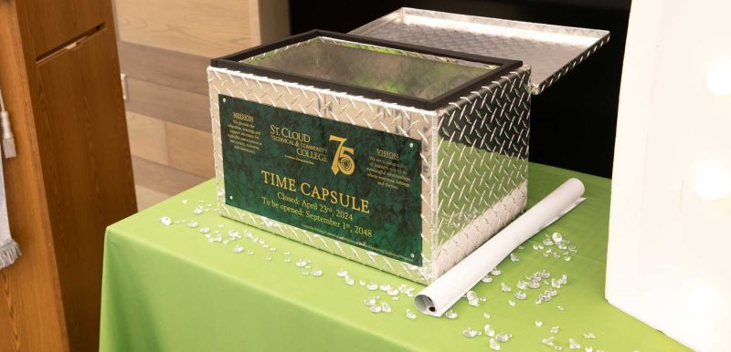 Time capsule metal box on table