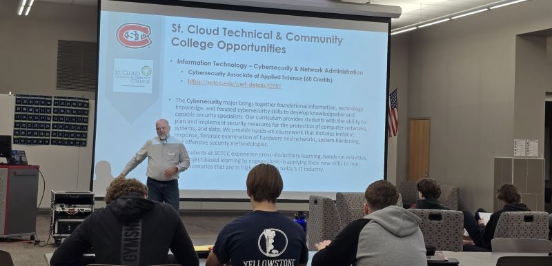 Brian Volkmuth in front of HS students presenting