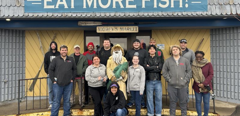 Students and instructors pose outside the Morey's plant