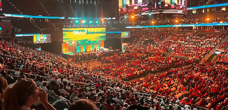 large crowd in an arena at skills conference
