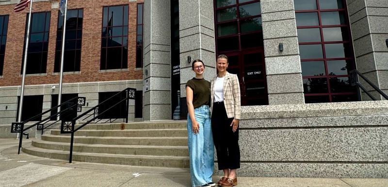 Ava and Emma on the steps of the Stearns County building