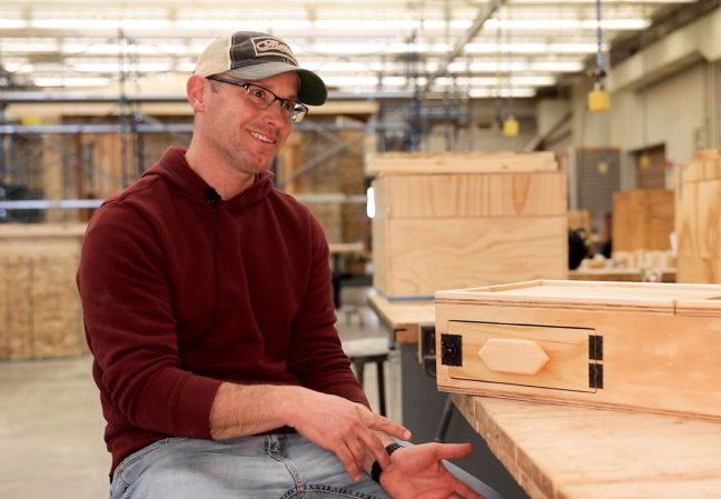 Mike Garrison in the carpentry lab with his box