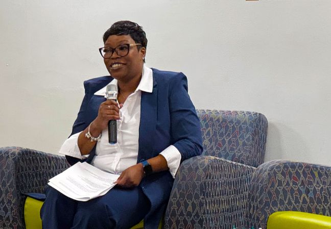 Ashley Easley speaking into microphone