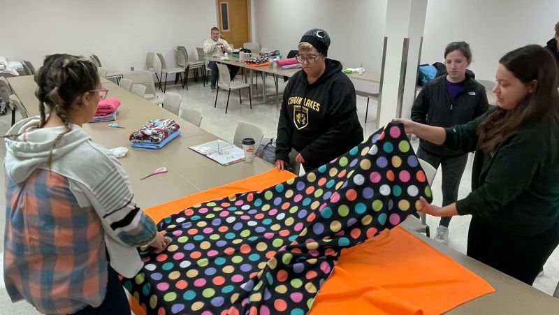 Students with blanket