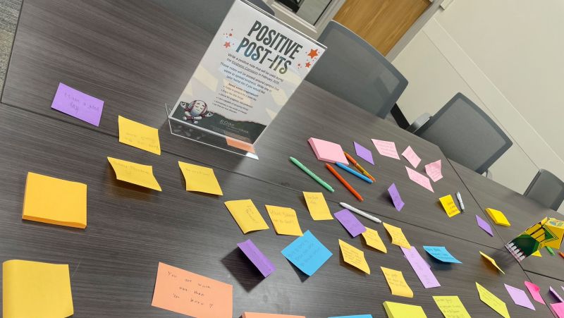 A bunch of post-its on a table
