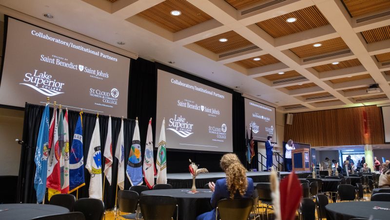 college logo on screen in SCSU ballroom