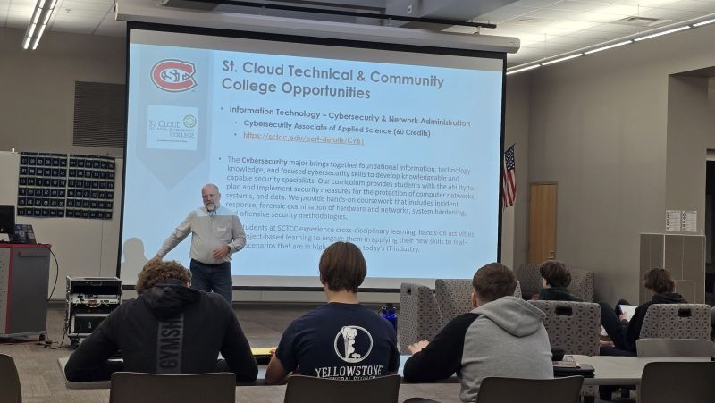 Brian Volkmuth in front of HS students presenting
