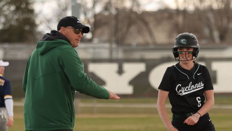 Greg Thorstad with a softball player