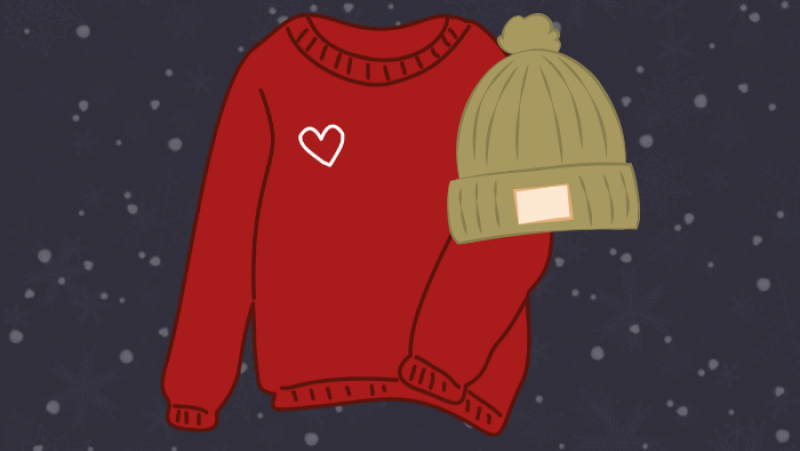 red sweater with a heart on it and a green beanie hat