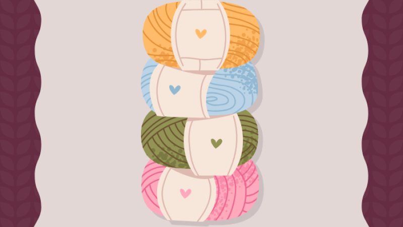 four skeins of yarn stacked on top of each other