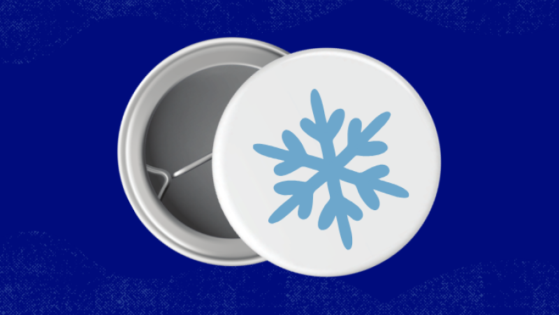 a pin button with a snowflake on it