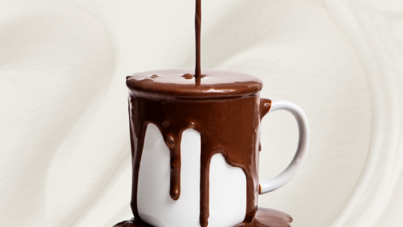 melted chocolate being poured into cup
