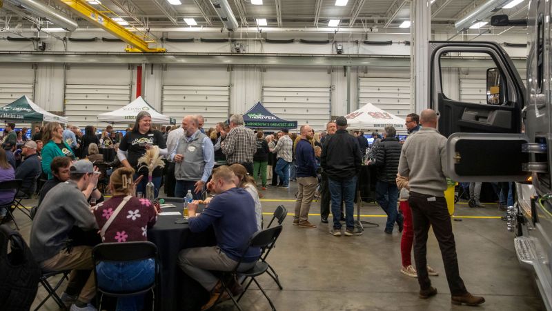 a large group of people int he diesel lab at BrewLash