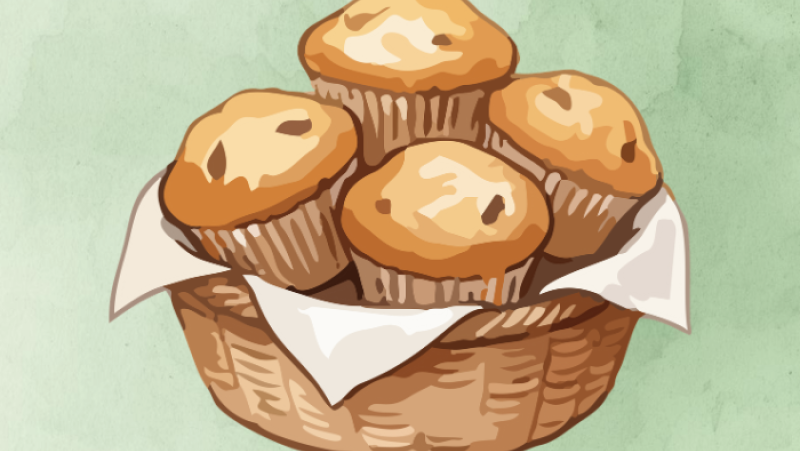 basket of muffins with green background