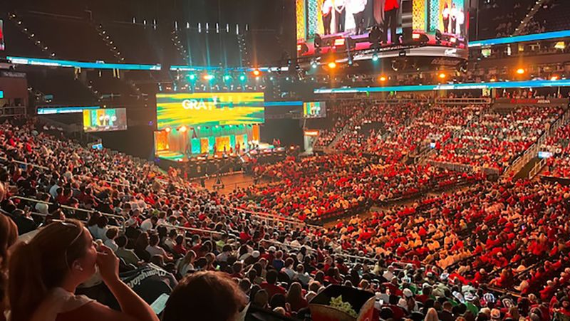 large crowd in an arena at skills conference