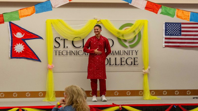 Aveen on stage in the Commons during Teej