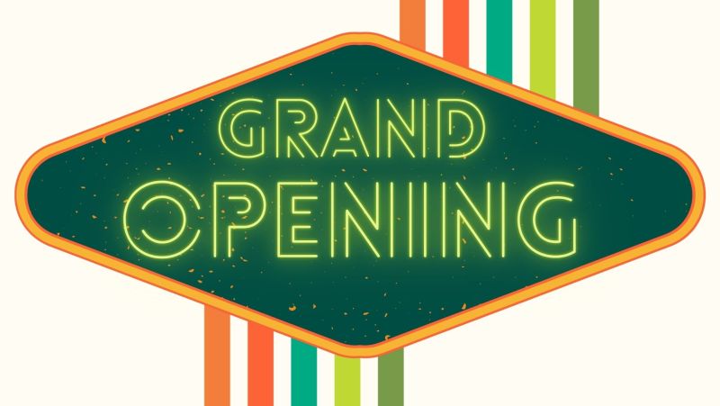 Grand opening text in neon light type letters