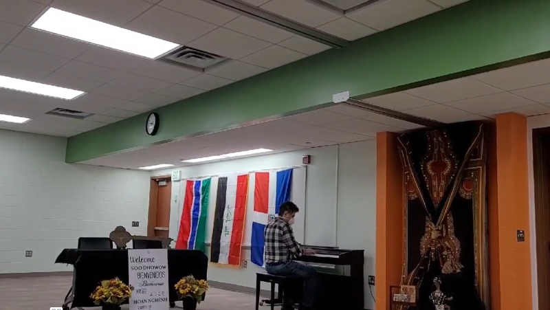 playing piano in the Multicultural Center