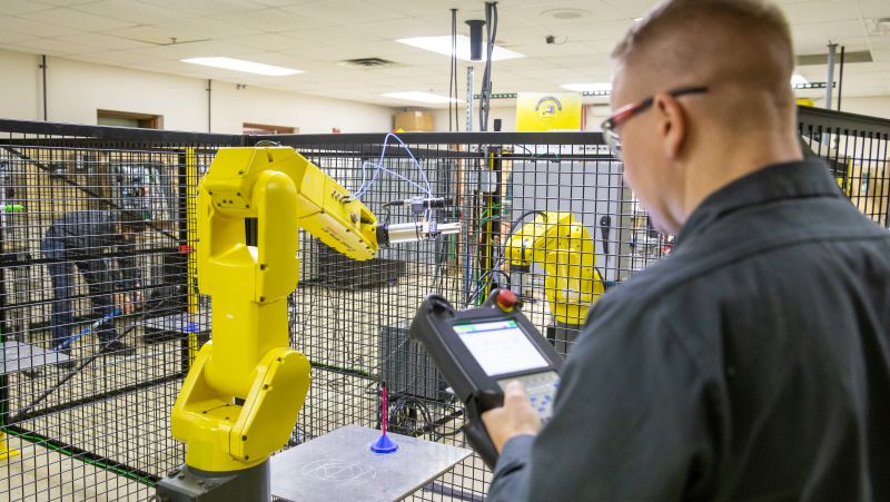 robotics lab with student using a fantek