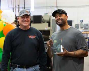 Chuck and Kevin with award